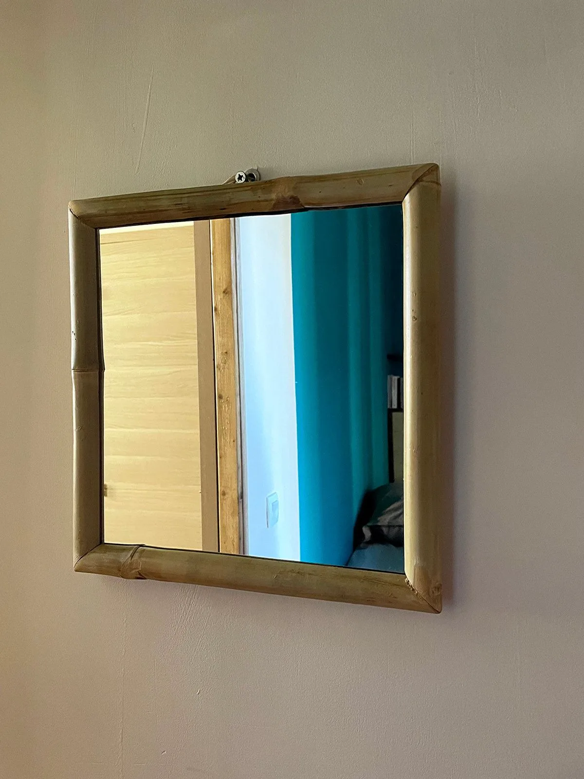 Miroir encadré de bambou